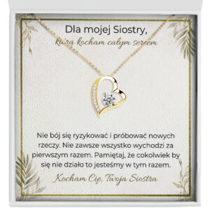 Zbliżenie na złoty naszyjnik serce - prezent dla siostry od siostry