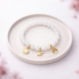 Biała bransoletka szczęścia na gumce