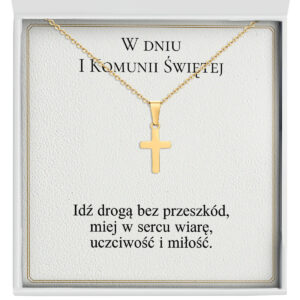 Zbliżenie na złoty łańcuszek z krzyżykiem na Komunię Świętą